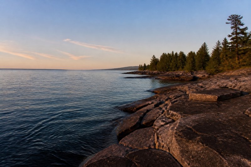 Rocky Great Lakes shoreline at sunset