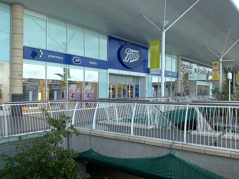 Front of a Boots pharmacy and beauty store in a shopping centre