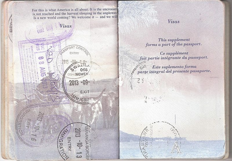 Open U.S. passport showing visa pages with entry and exit stamps