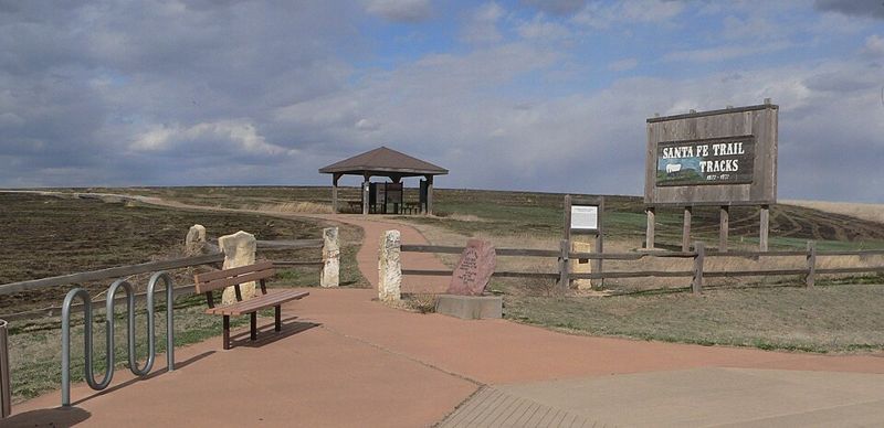 Grass-covered Santa Fe Trail wagon ruts at a rest stop in Ford County, Kansas