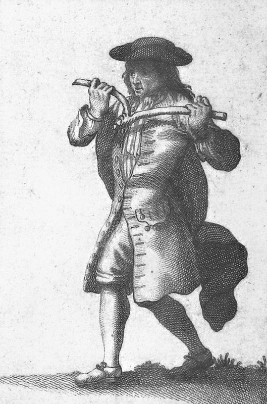 Eighteenth-century illustration of a dowser holding a forked rod