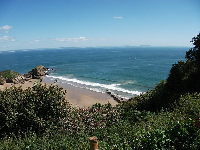 Rip currents cutting through breaking waves at Monkstone Beach
