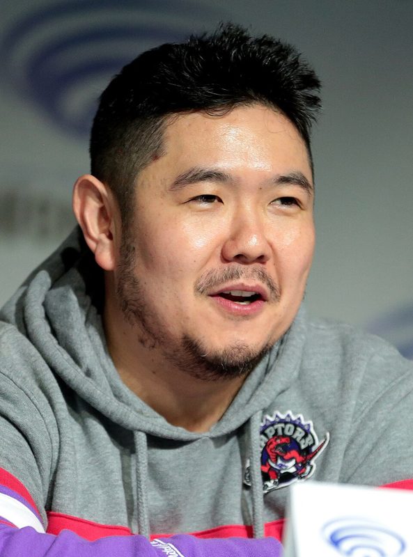 Voice actor Eric Bauza at a fan convention panel
