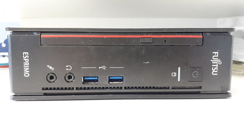 A small form-factor desktop computer, illustrating a compact personal computer like Ghost Core