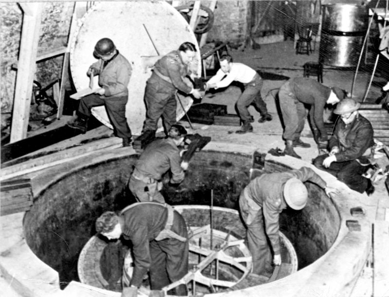U.S. Army Alsos Mission soldiers dismantling the German B8 experimental nuclear pile in a cave at Haigerloch, April 1945