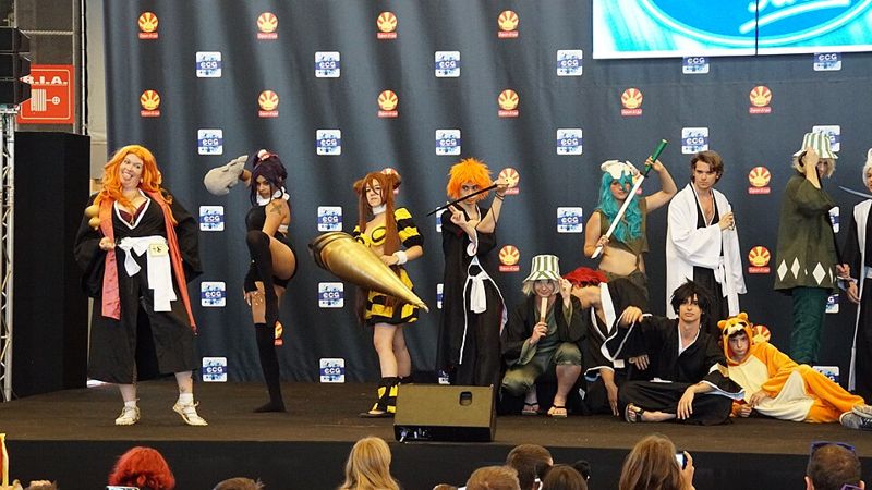Fans in Bleach character costumes on stage at Japan Expo 2016
