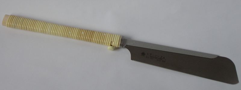 Japanese dozuki saw with a thin backed blade