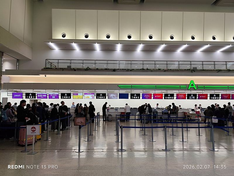 Airline check-in counters in the departure hall at Naha Airport, Okinawa