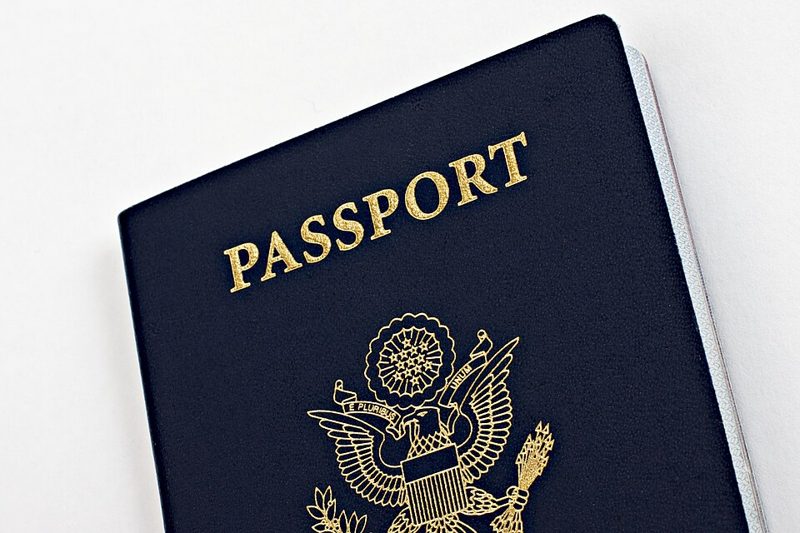 Navy blue U.S. passport book cover with gold eagle seal, the document you receive after learning how to get a passport