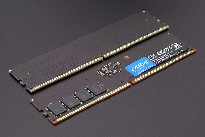 Crucial DDR5-4800 UDIMM memory module viewed from above showing chips and PCB