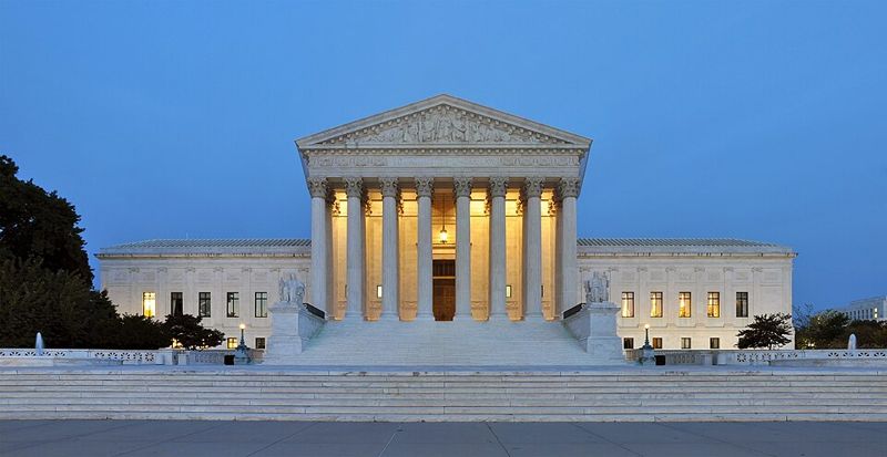 The United States Supreme Court Building in Washington, D.C., at dusk
