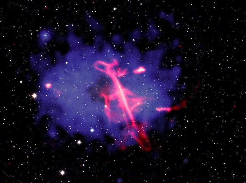 Composite image of the Treble Clef radio structure in a merging galaxy cluster (X-ray blue, radio red)
