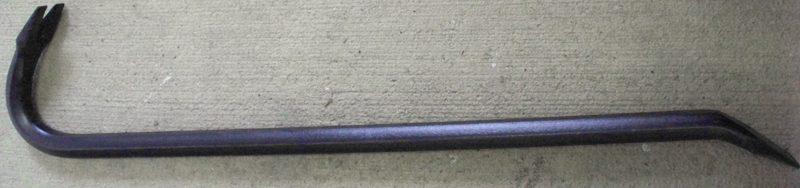 A black steel crowbar with a curved, notched nail-pulling end and a flat chisel end