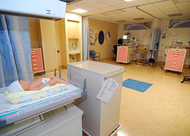 Neonatal intensive care unit room with monitoring equipment