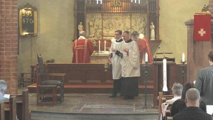 Incense smoke rising during a church service