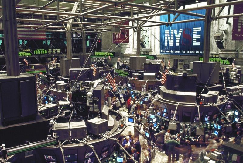 Traders and quote monitors on the New York Stock Exchange trading floor