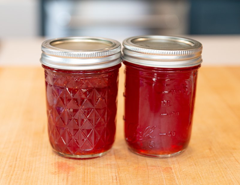 Side-by-side comparison of strawberry jam and strawberry jelly