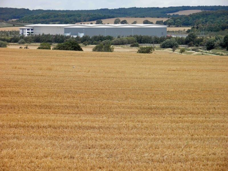 A large ASOS distribution warehouse seen across fields from Darfield in South Yorkshire