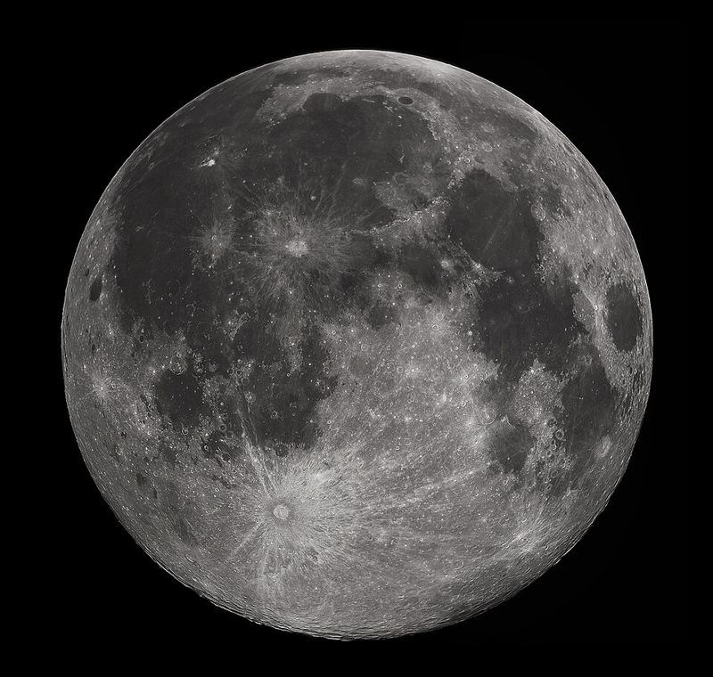 Detailed photograph of a full Moon showing its craters and dark maria
