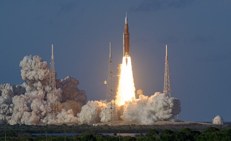 NASA's Space Launch System rocket lifting off on the Artemis II mission from Kennedy Space Center