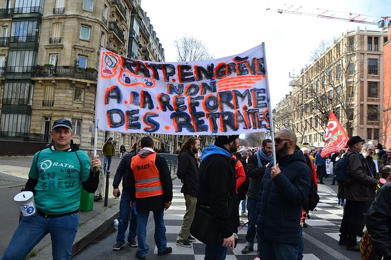 Crowd of demonstrators marching through a Paris street during an earlier protest (file photo)